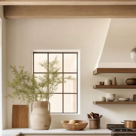 EF Architectural Design | Virtual Interior Designer on Instagram: "10 Tips to Elevate Your Kitchen Modern English Cottage Style  1. **Rustic Wooded Island**: Craft a culinary centerpiece with a rustic wooden kitchen island—a soulful anchor for your cooking adventures.  2. **Stucco Wall Warmth**: Surround yourself with warmth using warm white stucco walls—a backdrop that radiates coziness and timeless charm.  3. **Open Shelves Serenity**: Showcase the beauty of simplicity on wooden open shelves adorned with organic, wabi-sabi ceramics and vases—an homage to nature's imperfect elegance.  4. **Textured Kitchen Hood**: Make a statement with a kitchen hood mimicking the stucco walls' texture and color, with a  wooden frame —a harmonious blend of rustic and modern.  5. **Clay Vases Greenery**: E Stucco Interior Design, Plaster Kitchen Backsplash, Modern English Cottage Style, Rustic Wooden Kitchen, Walls Texture, Wooden Kitchen Island, Textured Kitchen, Modern English Cottage, Wabi Sabi Kitchen