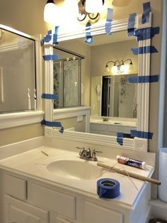 Frames For Bathroom Mirror, Frames For Mirrors Bathroom, Frame A Wall Mirror, Frames Around Bathroom Mirrors, Framing A Builder Grade Mirror, Diy Frame For Wall Mirror, Mirror Upgrade Diy Frames, Mirror Framing Ideas Bathroom, Frame A Bathroom Mirror Diy