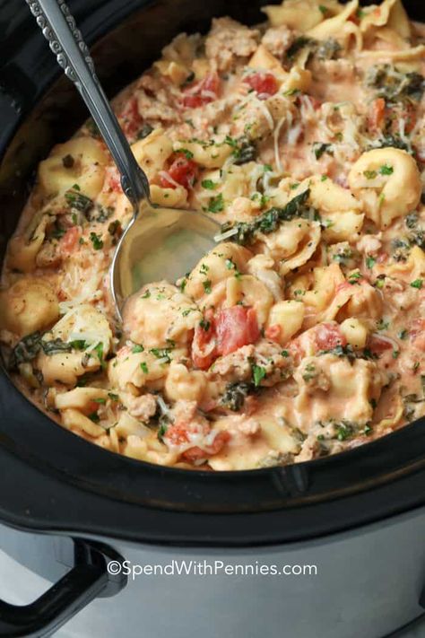 This creamy crockpot tortellini is an easy cheesy pasta dish! Made with sausage, cream cheese, and frozen tortellini it is simple to prepare and makes the most delicious supper with little effort. #spendwithpennies #creamycrockpottortellini #creamytortellini #slowcookerrecipe #crockpotrecipe #pastadish #creamypastasauce Tortellini Recipes Crockpot, Lazy Crock Pot Lasagna, Crockpot Tortellini, Crock Pot Tortellini, Cheese Tortellini Recipes, Sausage Crockpot, Sausage Soup Recipes, Crockpot Pasta, Chicken Tortellini