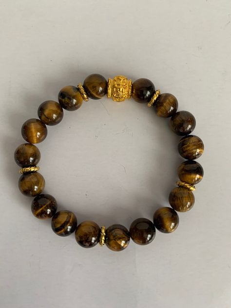 Beautiful handmade Tiger Eye elastic bracelet. Made of genuine natural 10mm stones. Tiger's Eye Bracelet, Tiger Eye Jewelry, Tiger Eye Bracelet, Bracelet Ideas, Eye Bracelet, Elastic Bracelet, Tiger Print, Tiger Eye, Jewelry Bracelets