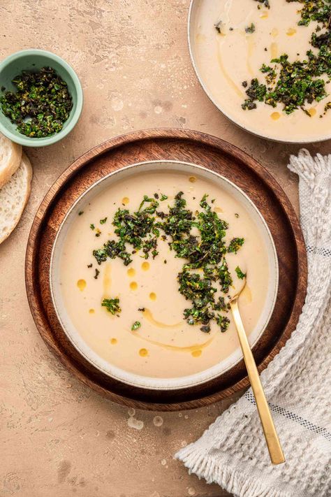 This vegan soup is creamy and satisfying without one bit of dairy. Garnishing it with a bright, fresh Italian herb condiment makes it extra special. Soup With Sage, Sage Soup, Creamy White Bean Soup, Gremolata Recipe, Dishing Out Health, Bean Soups, The Cozy Cook, Greek Lemon Chicken Soup, Cozy Cook