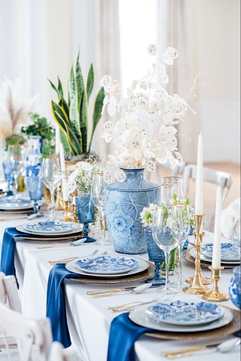 Ideas for pops of blue in your wedding reception table decor. Vendors: Photographer: Southern Vintage Photography; Event Venue: South Carolina Society Hall; Event Planner: Elizabeth Elkins Weddings & Events; Beauty: Silhouette On Site; Floral Designer: Creech’s Florist; Shoes: Kheloni; Cinema and Video: Palmetto Wedding Films; Caterer: Peared To Bee; Ring Designer: Polly’s Fine Jewelry; Hair Stylist: Brie Tallman Hair; Transportation: Whip Dash; Bridesmaid Dresses: Bella Bridesmaids; Dress Desi Greek Inspired Wedding, Blue Wedding Details, Floral Tablescape, White Tablescape, Chinoiserie Wedding, Southern Vintage, Beautiful Wedding Centerpiece, Halloween Tablescape, Mediterranean Wedding