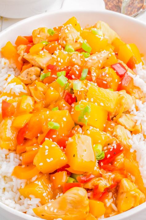 Hawaiian Pineapple Chicken Skillet— 🍗🍍🏝️Tender pieces of chicken are cooked with bell peppers and pineapple chunks, then coated in a SWEET and TANGY sauce! Pineapple chunks and pineapple juice create layers of tropical island flavor! This is a FAST and EASY recipe that’s ready in 30 minutes, made in a single skillet, and perfect for busy weeknights! Hawaiian Pineapple Chicken, Chicken And Pineapple, Stove Top Chicken, Pineapple Rice, Pineapple Chunks, Chicken Skillet, Hawaiian Chicken, Bell Pepper Recipes, Pineapple Recipes