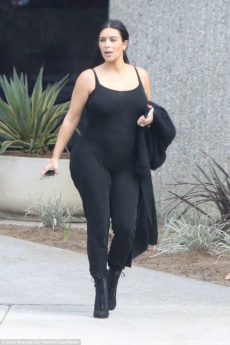 Kim Kardashian, who is four months pregnant, rocked a tight black catsuit in Calabasas, California on Wednesday - but fashion fans weren't impressed with her maternity style Kim Kardashian Pregnant, Black Catsuit, Kim Kardashian Outfits, Kim K Style, Kardashian Outfit, Kim Kardashian Style, Casual Maternity, Pregnancy Wardrobe, Maternity Jumpsuit