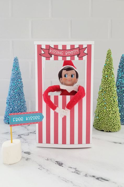 This Elf On The Shelf kissing booth may just be one of our new favorite elf ideas! Super cute and easy to make, the kids are going to love this adorable free printable! Elf On The Shelf Kissing Booth Printable, Elf Kissing Booth Free Printable, Free Elf On The Shelf Printable Ideas, Elf On The Shelf Kissing Booth, Elf On The Shelf Kisses Ideas, Elf Kisses Free Printable, Elf Free Printables, Elf Kissing Booth, Elf Printables Free