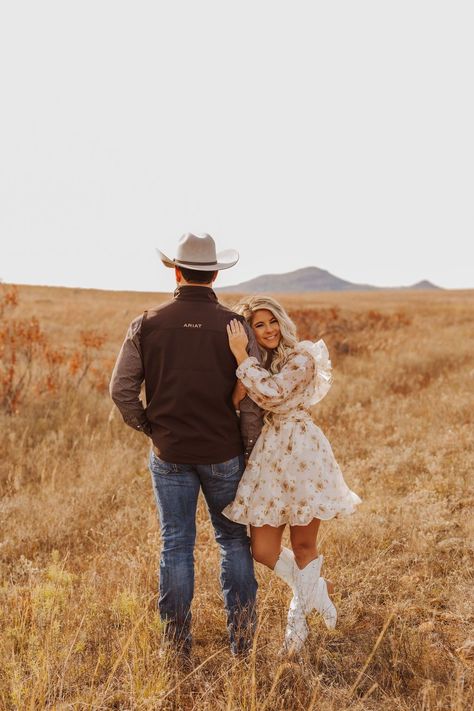 Western Couple Shoot for Engagements | Engagement photo poses | Texas Photographer. Watch as these love birds twirl under the stars, their western outfits adding a touch of cowboy charm to their intimate moments. Discover unique engagement photo shoot ideas, western couple look, modern country engagement photos and spring engagement photos. Book Krista to capture your western Texas engagement session at kristafrancisphotos.com. Cute Couple Western Pictures, Fall Western Photoshoot Couple, Engagement Photos Rustic Ideas, His And Her Photoshoot Photo Ideas, Western Style Couples Photoshoot, Cute Country Engagement Pictures, Modern Western Photoshoot, Engagement Photos Tennessee, Fall Engagement Pictures Western