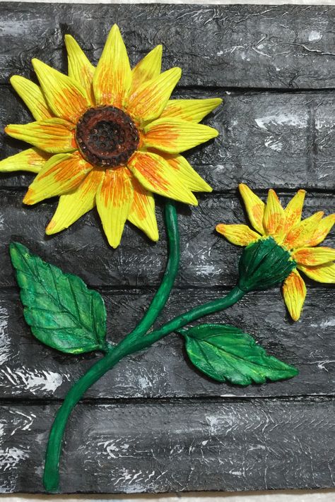 Amazing Sunflower Mural Art on Cardboard | Cardboard Craft | Clay Art Hello everyone, In this video i am sharing how to make Sunflower Clay Mural Art Painting on Cardboard with clay, this is very easy give it try. Clay Art On Cardboard, Sunflower Clay Art, Clay Mural Art, Mural Art Painting, Sunflower Mural, Clay Sunflower, How To Make Sunflower, Painting On Cardboard, Cardboard Craft