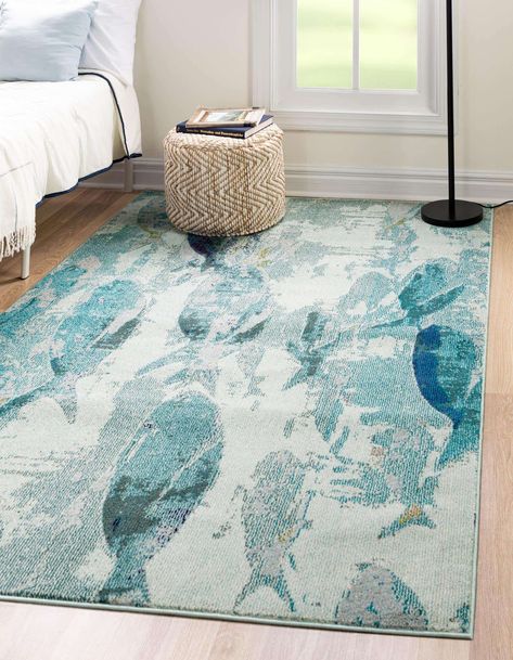 When it comes to decorating a beach house, no room will be complete until you’ve found the perfect area rug. Coastal homes tend to have a very differe... | Shades of Blue Fish Rug Coastal Area Rugs, Wooden Bunk Beds, Shed Colours, Fish Motif, Turkey Design, Light Blue Area Rug, House Remodel, Unique Loom, Cozy Nook