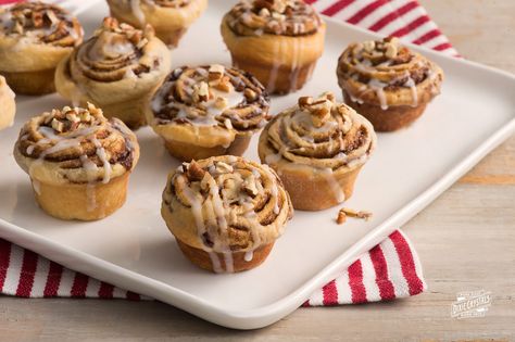 Fans of Little Debbie Pecan Spinwheels® are going to love this homemade version. Prepare these warm and cinnamony breakfast treats the day before but bake them fresh the next morning. Pecan Pinwheels, Coconut Quick Bread, Banana Cream Cheese Muffins, French Toast Muffins, Cream Cheese Muffins, Little Debbie, Sweet Dough, Hot Cross Buns, Cross Buns