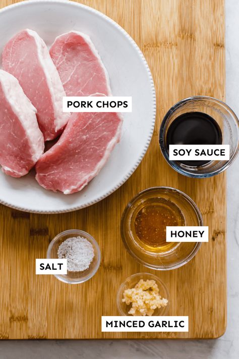 A few simple ingredients (honey, soy sauce, and garlic) can bring a simple pork chop to life in about 30 minutes! These Sweet & Savory Oven Baked Boneless Pork Chops not only come together in a flash but can also be prepped as a make ahead freezer meal. Make sure to reduce the marinade into a delectable, sticky sauce to drizzle over the top just before eating. A great weeknight meal that everyone will love! #porkchoprecipe #bonelessporkchop #freezermeal Boneless Center Cut Pork Loin Recipes, Porkchop Marinade Recipes Sauces, Pork Chop Marinade Baked, Boneless Pork Chops Oven, Oven Baked Boneless Pork Chops, Baked Boneless Pork Chop Recipes, Pork Chop Marinade Recipes, Baked Boneless Pork Chops, Teriyaki Pork Chops