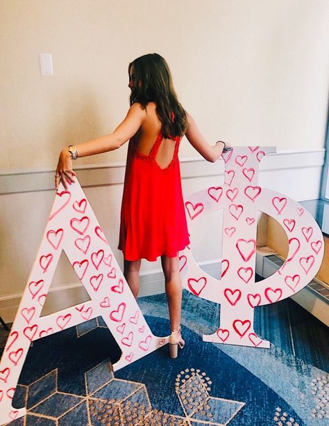 Heart Sorority Theme, Pink Sorority Letters, Red Dress Gala Alpha Phi, Alpha Phi Philanthropy, Alpha Phi Red Dress Gala, Sorority Recruitment Tips, Sorority Letters Painted, Alpha Phi Letters, Red Dress Gala