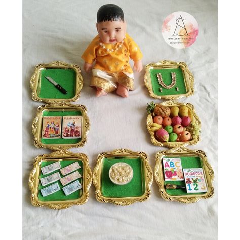 Annaprasana/ food ceremony theme doll with miniature clay work Ann Prashan For Baby Decoration, Annaprasana Items, Annaprashan Decoration, Baby Annaprasana Ideas, Kalamkari Dresses, Baby Cartoon Drawing, Photo Stills, Monthly Baby Pictures, Babies Stuff