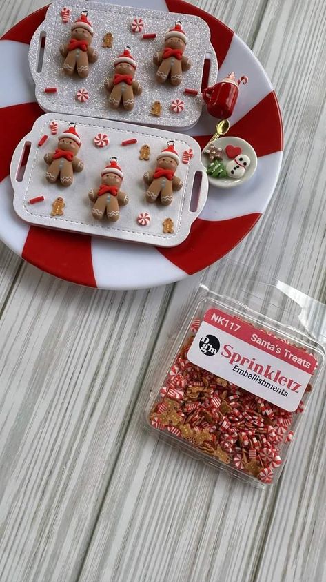 Santa's Treats is a craft embellishment item from Buttons Galore and More's Sprinkletz collection. These tiny polymer clay embellishments include various shapes and sizes of Christmas treat-themed shapes, such as gingerbread men and candy canes, perfect for adding a touch of holiday sweetness to your projects. Each piece measures approximately 5mm, making them ideal for decorating cards, scrapbook pages, ornaments, or other crafts. With approximately 600 pieces per pack, you'll have plenty to ch Dollar Tree Gingerbread Crafts, Mini Christmas Stocking Ideas, No Bake Gingerbread Ornaments, Gingerbread Snacks, Christmas Diorama Ideas, Gingerbread Clay Ornaments, Polymer Clay Peppermint Candy Tutorial, Fake Bake Christmas Ornaments, Clay Peppermint Candy