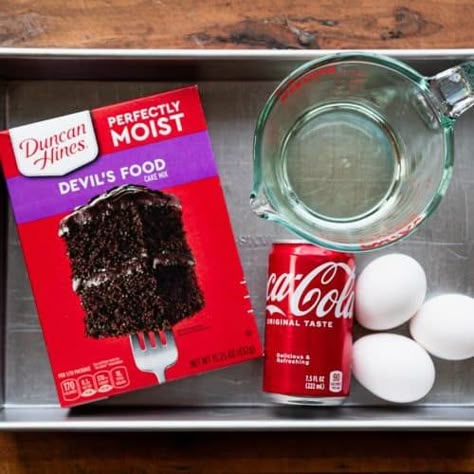 This Coca Cola cake is a classic Southern dessert made easy -- thanks to help from a box of cake mix! A homemade fudgy pecan and Coca Cola frosting coats each decadent slice of the moist and fluffy chocolate cake. Chocolate Box Cake Mix Recipes, Chocolate Coke Cake, Coca Cola Cupcakes, Chocolate Coca Cola Cake, Chocolate Box Cake, Chocolate Cake Mix Recipes, Coke Cake, Fluffy Chocolate Cake, Box Cake Recipes