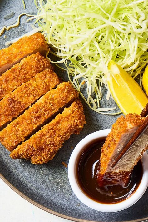 Tonkatsu (“ton” means “pork”; “katsu,” “cutlet”) is one of many dishes, along with hambagu (hamburger steak) and kare raisu (curry rice), that are broadly categorized within Japanese cuisine as Yoshoku: European or American dishes that have been embraced and adapted to suit local tastes. Kare Raisu, Pork Katsu, Fried Pork Chops, Hamburger Steak, Curry Rice, America's Test Kitchen Recipes, American Dishes, Boneless Pork Chops, Mango Salad