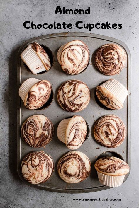 Perfectly domed, soft and tender Almond Chocolate Cupcakes , a creative and easy baked from scratch recipe idea. Perfect for July 4th and birthday party. |#cupcakes #cupcakesrecipe #easycupckerecipe #fastrecipe #fastcupcakerecipe #birthdaycupcakes #almondcupcakes #creativecupcakesrecipe #recipe #dessert #july4thdessert #july4th #birthdaycupcakes #almondcucpakerecipe #choclatealmondcupcakerecipe onesarcasticbaker.com| Chocolate Almond Cupcakes, Unique Chocolate Cupcake Flavors, Unique Chocolate Cupcakes, Unique Baking Recipes, Birthday Party Cupcakes, Bread Photography, Almond Buttercream, Cupcake Recipes For Kids, Baking Vegan