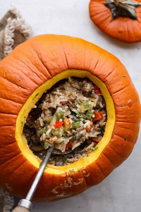 Take your spooky season celebrations up a notch with this festive dinner in a pumpkin! It’s filled with a creamy, savory sausage and rice pilaf that’s sure to be a hit with your family. So delicious, it’s scary. Pumpkin Recipes Vegetarian, Dinner In A Pumpkin, Pumpkin Recipes Dinner, Stuffed Pumpkin, Savory Rice, Pumpkin Smoothie, Slow Cooker Pumpkin, Pumpkin Recipe, Australia Food