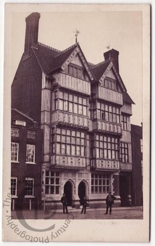 A carte-de-visite view of Knight Brothers Bank on Castle Street in Farnham, Surrey. Designed by the renowned architect Richard Norman Shaw (1831-1912), the four-floored timber-framed building was completed in 1868.  It was demolished and replaced by the present Lloyds Bank in 1932. The chimneys were re-erected by Harold Falkner on the Bush Hotel and the Bailiffs Hall.  The Knight family of Farnham were hop farmers, brewers and bankers.  The brothers John and James Knight established a bank in... Farnham Sofa, Farnham Surrey, Barnsley South Yorkshire, Lloyds Bank, Durham County, My Favorite Image, Architecture Presentation, Architecture Model, Family History