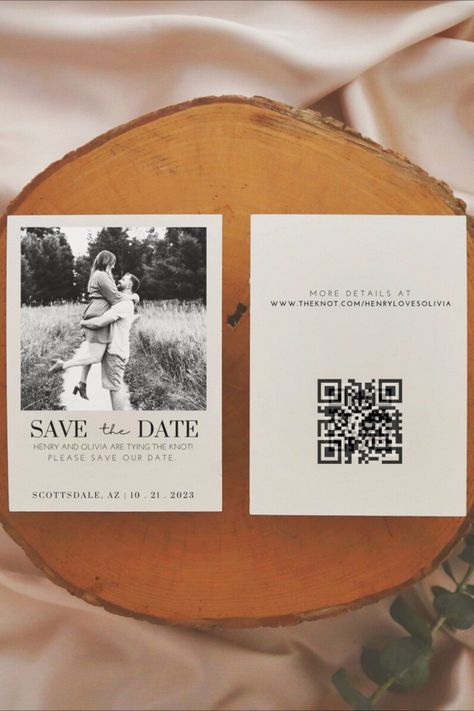 Light pink satin backdrop features a sprig of eucalyptus and a rustic wood platter supporting a neutral-toned Save the Date card. Card design features large, sleek serif font with the words "Save the Date" displayed clearly under a black and white photo of a man and woman embracing happily in a field. The words "Henry and OIivia are typing the knot! Please save our date. Scottsdale, AZ, 10, 21, 2023" below. Card Side B: "More details at [wedding website URL], with a QR code image below." Easy Save The Dates, Save The Date Ideas Canva, Diy Save The Date Cards, Rustic Wedding Save The Date Ideas, Save The Day Ideas, Wedding Save The Date Ideas Unique, Save The Date Aesthetic, Save The Date Ideas Photos, Rustic Save The Date Ideas