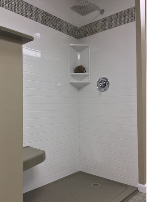 White subway tile looking shower wall panels with a mosaic border | Innovate Building Solutions Tile Above Shower Surround, Shower Ceiling Tile, Fiberglass Shower Stalls, Bathroom Panels, Standing Pantry, Shower Background, Mosaic Border, Lakehouse Ideas, Spare Bathroom