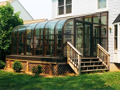 Curved Eave Style Sunrooms and Solariums | Maryland Sunrooms Side Greenhouse, Victorian Conservatory Interior, Solarium Ideas, Solarium Room, Sunroom Kits, Glass Sunroom, Four Season Sunroom, 60s House, Midcentury Architecture