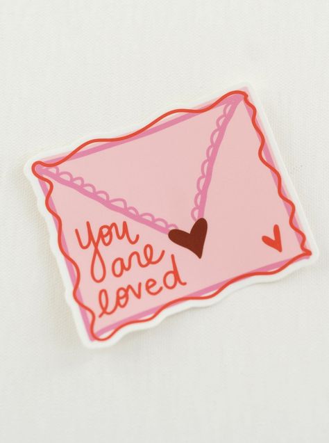 Grab a few of these sweet little reminder stickers to tuck in your Valentine cards this year. Pretty in pink and lots of contrast makes this sticker POP. Your friends and family will love to stick on their laptops, notebooks, or water bottles. Vinyl Sticker This sticker is 4" x 3.47" Perfect for laptops, water bottles and notebooks Opportunities are endless! Grab on for you and a friend! © Doe A Deer LLC. All Rights Reserved. Illustrations and product images may not be used or reproduced without February Stickers, Valentine's Aesthetic, Made With Love Stickers, Notebook Illustration, Valentines Vibes, Valentines Stickers, Mom Stickers, Birthday Craft, Envelope Sticker