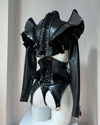 Architecture 🏹 Strong lines, heavy construction and commanding. 💀 This set made of Metallic pewter and black features a pleated wing… | Instagram Metal Style Outfits, 2023 Architecture, Metallic Clothing, Drag Queen Outfits, Shoulder Jacket, Preformance Outfits, Concept Clothing, 3d Fashion, Trendy Fashion Tops