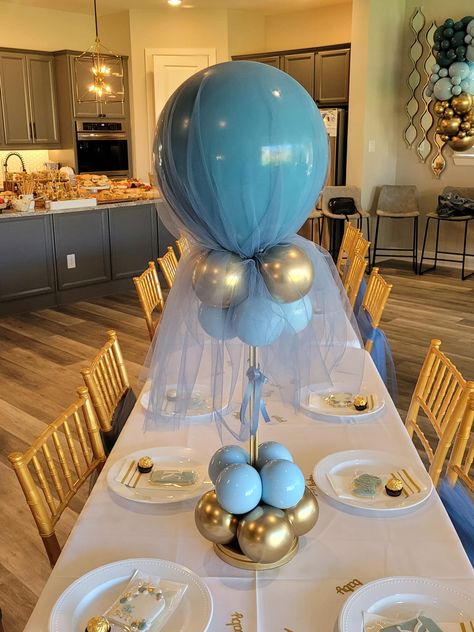 Balloon Centerpiece with Tulle for Baby Shower by Capri & Eros Occasions Houston Gender Reveal Table Centerpieces, Baby Boy Shower Centerpieces, Baby Shower Balloon Centerpieces, Gender Reveal Centerpieces, Baby Shower Centerpieces For Boys, Ballon Ideas, Balloon Baby Shower Centerpieces, Tulle Balloons, Boy Baby Shower Centerpieces