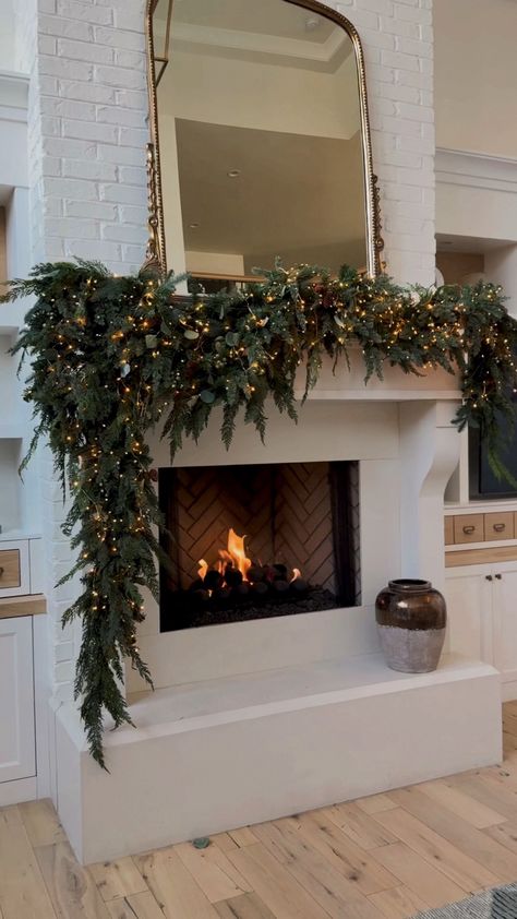 Shop Majestic Holiday Garland and other curated products on LTK, the easiest way to shop everything from your favorite creators. Mantle With Garland And Stocking, Fireplace Mental Christmas Decor, Restoration Hardware Holiday Decor, Ranch Style House Christmas Lights, Minimal Christmas Outdoor Decor, Outside Of House Christmas Decor, Garland Christmas Fireplace, Christmas Garland Aesthetic, Christmas Decor Diy Garland