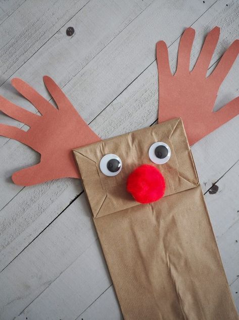 Christmas Paper Bag Puppets  Reindeer craft, Reindeer puppet, rudolph craft, handprint reindeer crafts #santabrucebook Reindeer Puppet, Handprint Reindeer, Easy Craft Ideas For Kids, Rudolph Crafts, Reindeer Crafts, Diy Reindeer, Diy Elf, Craft Handprint, Paper Plate Crafts For Kids