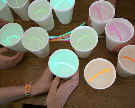 How do glow sticks work? Explore their chemistry by comparing what happens when you submerge them in different temperatures. Science Lab Activities, Crafts With Glow Sticks, Glow Science Experiments, Glow Stick Experiment, Birthday Stem Activities, Glow Day Science Activities, Light Theme Preschool Activities, Glow Stick Science Experiment, Kids Chemistry Experiments