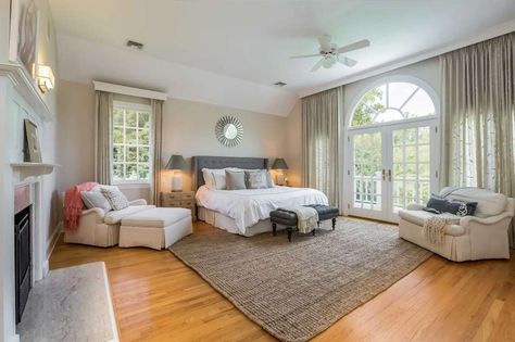 Master bedroom: On the second floor the master suite has a separate wing with a sitting room, fireplace in the bedroom, and French doors to a private balcony. Corner China Cabinet, Tumbled Marble Tile, Cafe Door, Marble Tile Floor, New Canaan, Buy A Home, Living And Dining Room, Real Estate Agency, Tasting Room