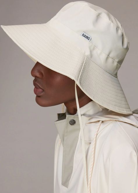 Buy Ivory Rains Boonie Hat | WHISTLES whistles.com. A transitional accessory we can't get enough of - this Rains Bucket Hat is 100% waterproof in an easy, white hue. Relaxed Hat, Fashion Bucket Hat, Rain Hats, Rain Hats For Women, Boonie Hat Outfit, Boonie Hat, Bucket Hat Fashion, Waterproof Hat, White Bucket Hat