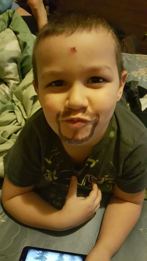 Thomas Michael with his mustache & goatee that uncle Jeff painted on him! Lol Tate Face Paint, Mustache Face Paint, Face Paint With Beard, Mustache Makeup, Baseball Face Paint Black, Face Paint Moustache, Halloween Boy Face Paint, Mustache Painting, Mustache And Goatee