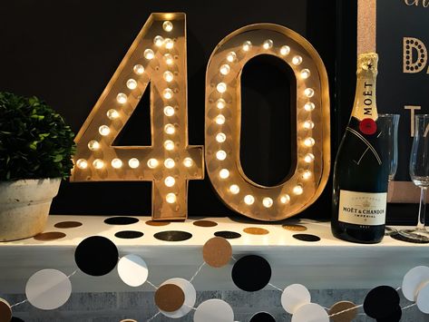 These super easy DIY marquee letters or numbers are perfect for so many different occasions. Milestone birthday parties, graduation parties,  New Year’s Eve parties, Halloween parties, Christmas parties, oh my! We made these for a recent birthday party and I loved how they turned out. Diy Marquee Numbers, Diy 40th Birthday Decorations, 40th Birthday Party Themes, 40th Birthday Themes, 40th Party Ideas, Marquee Numbers, Diy Marquee Letters, Husband 40th Birthday, 40th Birthday Men