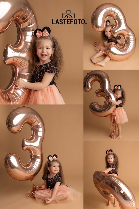 A three-year-old girl dressed in a peach and black dress with matching mouse ears, joyfully interacting with a large rose gold number 3 balloon during a birthday photo shoot. The photos capture her playful expressions and excitement, highlighting the celebration of her third birthday against a soft, neutral background. 4 Year Photoshoot, 3rd Birthday Studio Photoshoot, Three Year Old Birthday Photo Shoot, Third Birthday Photoshoot Ideas, 3 Birthday Photoshoot, Photoshoot Ideas 1st Birthday, 3 Year Birthday Photoshoot, Three Year Old Photo Shoot, 3rd Birthday Photoshoot Ideas