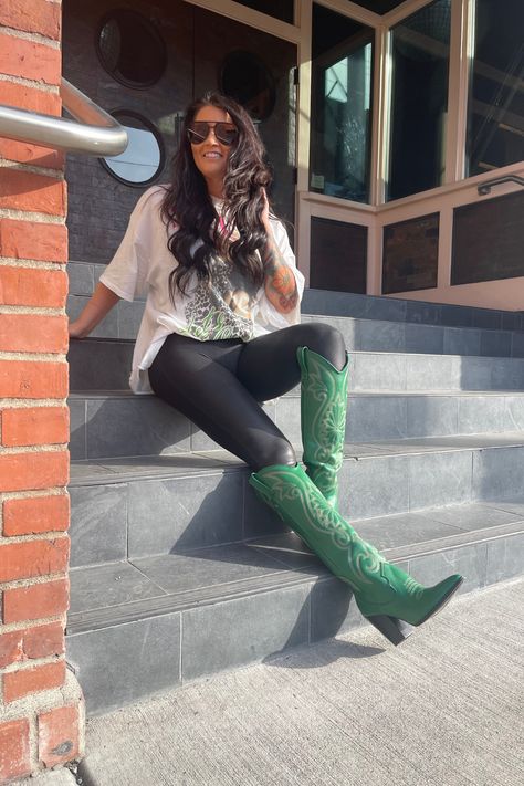 I love these green cowgirl boots. They are the ultimate statement piece. #cowgirlboots #cowboyboots #stevemaddenboots #greenboots #kellygreenboots #funboots Green Metallic Cowboy Boots, Green Western Boots, Statement Boots Outfit, Outfit With Green Boots, Thigh High Cowgirl Boots Outfit, Green Knee High Boots Outfit, Green Western Boots Outfit, Emerald Green Western Outfit, Teal Cowboy Boots Outfit