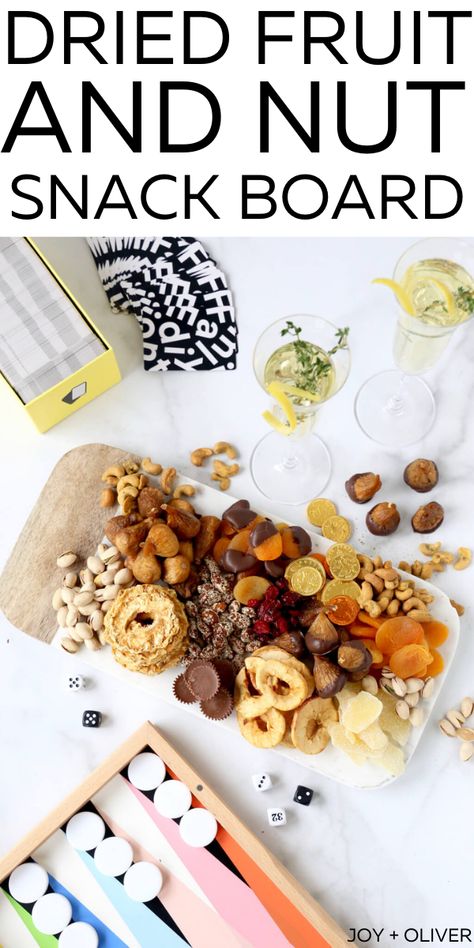 New Years Eve Dried Fruit and Snack Board made of a variety of sweet, salty, spicy and chocolate pairs perfectly with a game night in to end the year. This board makes the perfect appetizer for any holiday or gathering! #appetizer #cheeseboard #nuts #driedfruit Nut Board Ideas, Nut Board, Fruit Appetizers, Chocolate Pairings, Non Perishable, Appetizer Trays, Nut Snacks, Holiday Dessert Recipes, New Year's Eve Recipes