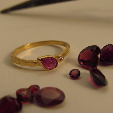 The Ring Made From 14 Karats Solid Yellow Gold. Ring Width 0.05inch/ 1.5mm. The House Stone Diameter 0.17x0.27inch/ 4.5x7mm. Natural Teardrop Red Ruby. 1 White Diamond 0.01ct Hvs1. Beautiful Gold Ring Bezel Set With A Ruby And Diamond. Rough But Accurate. Handmade One Of A Kind. A Perfect Present For Any Occasion. Available In All Sizes, Color, Gold And Karat, And Matte Or Shining Finish. If You Want A Custom Ring Please Contact Me Before Purchase. Bevel Ring, Ruby Engagement Ring Gold, Staple Jewelry, Ruby Stone Ring, Red Diamond Ring, Antique Ruby Ring, Gold Ruby Ring, Beautiful Gold Rings, Gold Pinky Ring