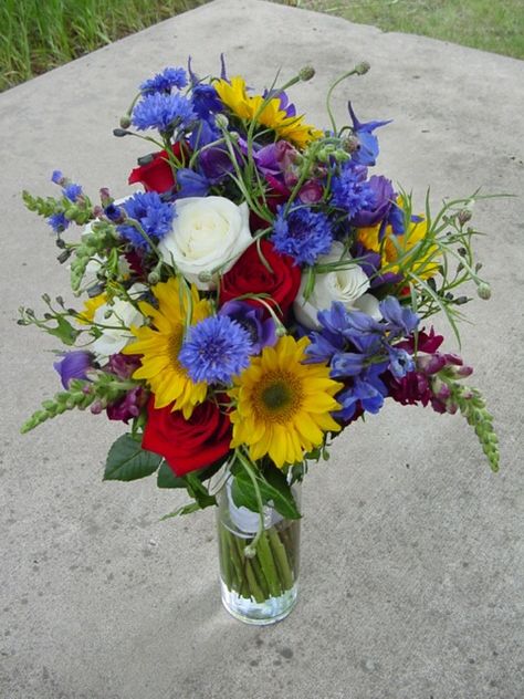 blue delphinium, blue bachelor buttons, white roses, red roses, mini yellow sunflowers Crafty Wedding, Red Flower Arrangements, Delphinium Blue, Wildflower Wedding Bouquet, Sunflower Themed Wedding, Yellow Bouquets, Bachelor Buttons, Blue Delphinium, Yellow Sunflowers