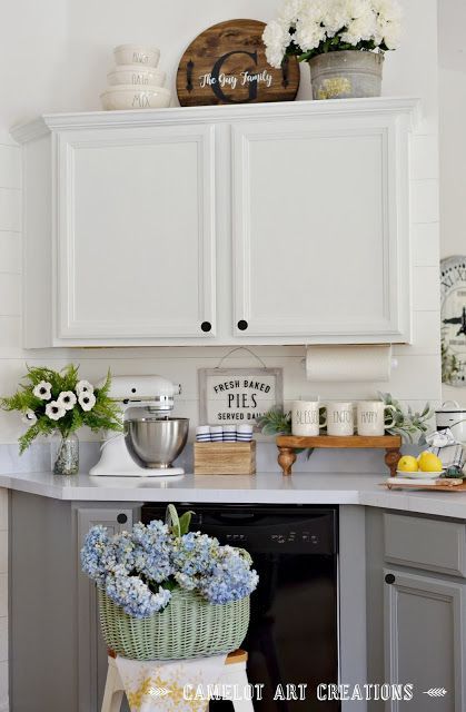 How To Decorate Above Kitchen Cabinets Farmhouse, Kitchen Shelf Decor Farmhouse Style, What To Put Above Kitchen Cabinets, Styling Above Kitchen Cabinets, Above Cupboard Decor, Over Cabinet Decor, Top Kitchen Cabinets Decor, Camelot Art, Decorating Above Kitchen Cabinets Ideas