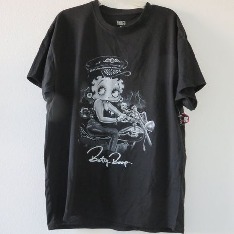 New With Tags Betty Boop Black & Gray Motorcycle Graphic Print 60/40 Cotton/Poly Size L Armpit To Armpit 20.5" Inches Shoulder To Hem 27.5" Inches Size Xl Armpit To Armpit 23.5" Inches Shoulder To Hem 29" Inches Questions? Leave A Comment Below! Streetwear Fashion Graphic Tee, Baggy Shirts For Women, Thrift Shirts, Graphic Tees For Women, Baddie Shirts, Motorcycle Shirts, Black Y2k Style Graphic T-shirt, Betty Boop Shirt, Betty Boop Tee Shirts