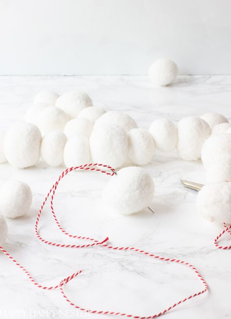 Easy Garland DIY – 5 Minute Project Snowball Garland Diy, Cotton Ball Snow Garland, Winter Garland Ideas, Diy Snowflake Garland, Winter Garland Diy, Snowballs Diy, Marshmallow Garland, Easy Garland, Snowman Garland