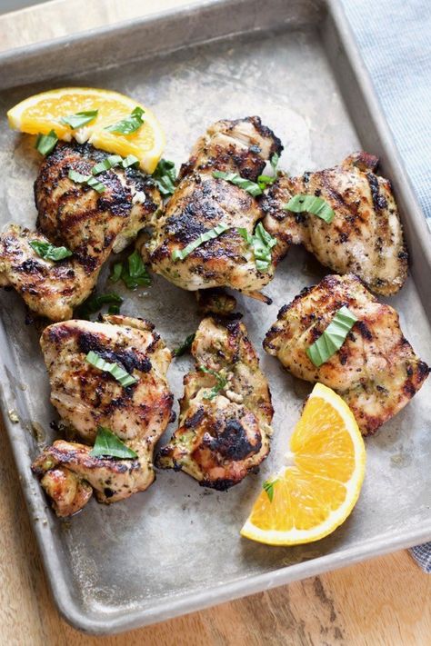 Citrus herb marinated grilled chicken is an easy summer meal! The marinade has lots of fresh flavor from lime and orange juice, plus a zing from jalapeño, garlic, and fresh basil or cilantro! Citrus Marinated Chicken, Herb Marinade, Citrus Marinade, Marinated Chicken Recipes, Marinated Chicken Thighs, Chicken Marinade Recipes, Refreshing Food, Steak Marinade, Easy Summer Meals