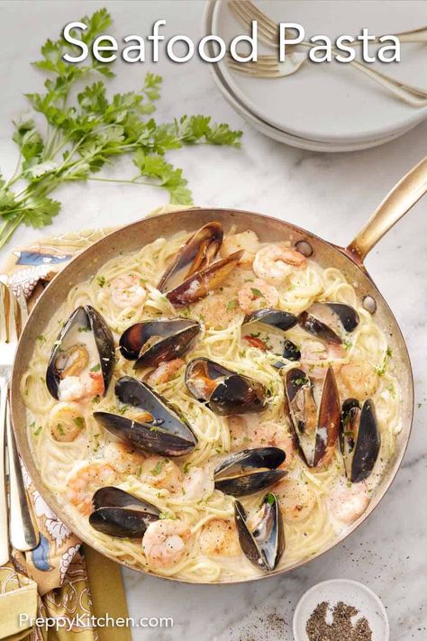 Ready in under 30 minutes, this Seafood Pasta is simple to make and packed with indulgent flavors. Delicious shrimp, scallops, mussels, and perfectly al dente linguine are bathed in a rich, creamy sauce and topped with shredded parmesan cheese. It is an easy recipe that will satisfy your seafood cravings and make any occasion feel special! Mussels Recipe Pasta, Seafood Cravings, Creamy Seafood Pasta, Mussels Pasta, Seafood Soups, Cold Pasta Dishes, Seafood Sandwiches, Seafood Linguine, Scallop Pasta