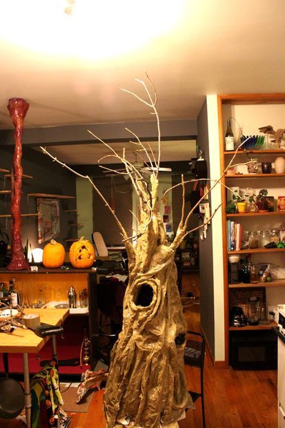 O the powers of packing tape. Make this fancy tree, or any other sculpted costume, in no time with little investment. The results are lightweight and easy to wear,... Tree Halloween Costume, Paper Mache Tree, Fancy Tree, Tree Costume, Picture Molding, Indoor Trees, Diy Tree, Halloween Tree, Paper Mache Sculpture