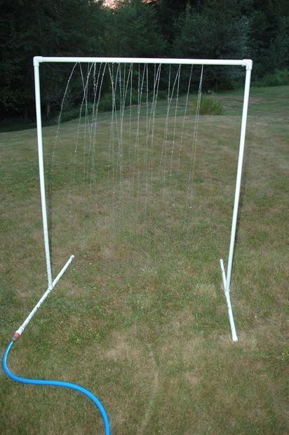 PVC Sprinkler Water Toy - how smart is this? $10 worth of materials from the hardware store will bring lots of joy this summer. :) My friend did this with her kids and used a couple of pipes and plastic streamers as well, they called it a "car wash" and rode their bikes through it. They played with it all summer. Pvc Sprinkler, Pvc Projects, Summer Water, Water Toys, Summertime Fun, Backyard Fun, Pvc Pipe, Cheap Diy, Outdoor Fun