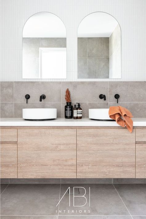 The modern bathroom — a place where function and form unite to provide great design. ⁠ ⁠ In Maybree Villas by @sd_architects⁠, @instyle_byrhi⁠ and @360propertydevelopment⁠, the neutral scheme is deepened by our matte black tapware and the dark accent on our Bowie Basin Sinks. ⁠ ⁠ The floating vanity makes the room feel lighter, while double mirrors reflect the natural sun that streams through. ⁠ ⁠ What do you like most about this space?⁠ Black Tapware, Matte Black Bathroom Accessories, Black Kitchen Taps, Abi Interiors, Main Bathroom Ideas, Matte Black Bathroom, Black Bathroom Accessories, Bathroom Inspiration Modern, Bathroom Tapware