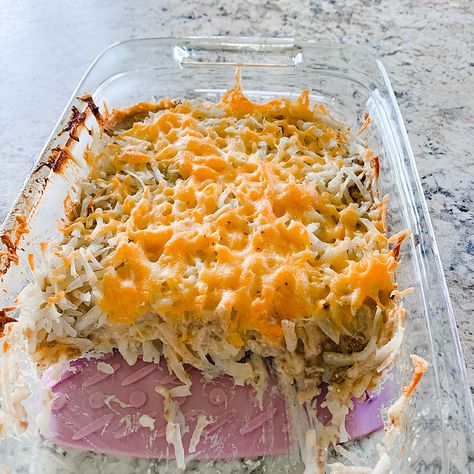 Cowboy casserole is a fun twist on tater tot casserole. It's creamy filling has smokey bacon, shredded hash browns, and ground beef. Cowboy Casserole Recipe, Cowboy Casserole, Pillsbury Crescent, Shredded Hash Browns, Lipton Onion Soup Mix, Taco Bake, Beef Casserole Recipes, Crescent Roll, Shredded Lettuce