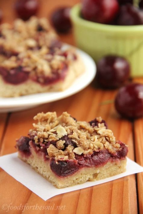 These healthy cherry crumble bars are perfect for summer! They have a soft cookie “crust,” sweet cherry filling & oat crumb topping. It’s like eating 3 desserts in one — and they’re simple to make too! Healthy cherry oat bars. Cherry bars recipe simple. Cherry crumble bars easy. Vegan cherry oat bars recipe. #healthyrecipe #vegan #cleaneating Cherry Dessert Bars, Cherry Crumble Bars, Low Fat Dessert Recipes, Bowl Of Cherries, Cherry Crumble, Low Fat Desserts, Cherry Desserts, Crumble Bars, Dessert Bar Recipe